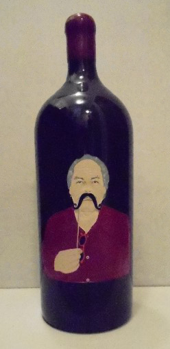 An etched wine bottle